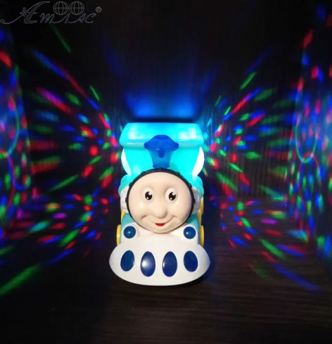 Іграшка Паровозик Томас Червоний з диско кулею світло, звук у коробці  09825 фото 4