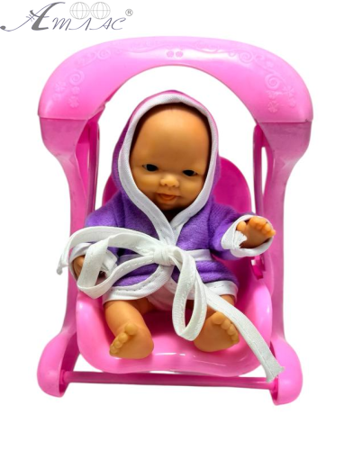 Іграшка Пупс гумовий 10см на гойдалці  09614